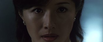 Movie still from “Godzilla: Final Wars” (2004), directed by Koji Hashimoto – A woman's eyes and face; Extreme Close Up shot, High angle