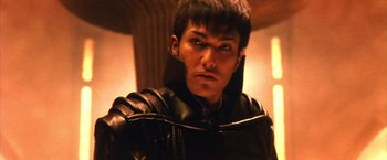 Movie still from “Godzilla: Final Wars” (2004), directed by Koji Hashimoto – A person wearing a suit of armor; Close Up shot, Low angle