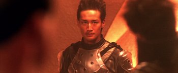 Movie still from “Godzilla: Final Wars” (2004), directed by Koji Hashimoto – A person wearing a suit of armor; Close Up shot, Low angle