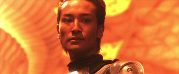 Movie still from “Godzilla: Final Wars” (2004), directed by Koji Hashimoto – A person wearing a suit of armor; Close Up shot, Low angle