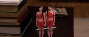 Movie still from “Godzilla: Tokyo S.O.S.” (2003), directed by Takao Okawara – A couple of women standing next to each other; Medium shot, High angle