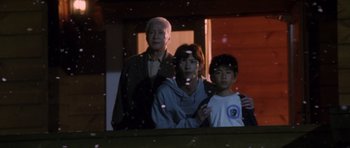 Movie still from “Godzilla: Tokyo S.O.S.” (2003), directed by Takao Okawara – A group of people standing next to each other in a room; Medium shot, Low angle