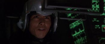 Movie still from “Godzilla: Tokyo S.O.S.” (2003), directed by Takao Okawara – A person wearing a helmet; Close Up shot, Low angle