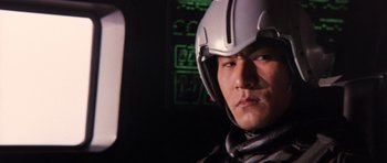 Movie still from “Godzilla: Tokyo S.O.S.” (2003), directed by Takao Okawara – A man wearing a helmet in front of a control panel; Close Up shot, Low angle