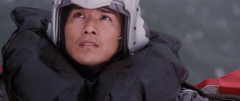Movie still from “Godzilla: Tokyo S.O.S.” (2003), directed by Takao Okawara – A person wearing a helmet; Close Up shot, High angle