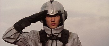Movie still from “Godzilla: Tokyo S.O.S.” (2003), directed by Takao Okawara – A man wearing a helmet and a leather jacket; Close Up shot, Low angle