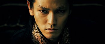 Movie still from “Goemon” (2009), directed by Kazuaki Kiriya – A person wearing a shirt; Close Up shot, Low angle