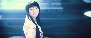 Movie still from “Goemon” (2009), directed by Kazuaki Kiriya – A woman with long black hair wearing a pink and white kimono; Close Up shot, Low angle