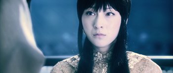 Movie still from “Goemon” (2009), directed by Kazuaki Kiriya – A woman with long black hair wearing a white dress; Close Up shot, Low angle