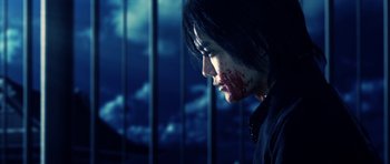 Movie still from “Goemon” (2009), directed by Kazuaki Kiriya – A woman with blood on her face looking into the distance; Close Up shot, Low angle