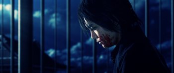 Movie still from “Goemon” (2009), directed by Kazuaki Kiriya – A man with blood on his face looking at the sky; Close Up shot, Low angle
