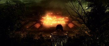 Movie still from “Goemon” (2009), directed by Kazuaki Kiriya – A fire is burning in the middle of the night; Extreme Wide shot, High angle