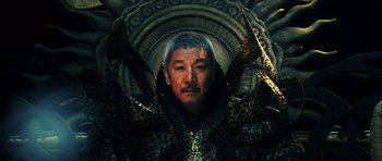 Movie still from “Goemon” (2009), directed by Kazuaki Kiriya – An older man with long hair and a mustache; Medium shot, High angle