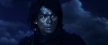 Movie still from “Goemon” (2009), directed by Kazuaki Kiriya – A person wearing a black shirt; Close Up shot, Low angle