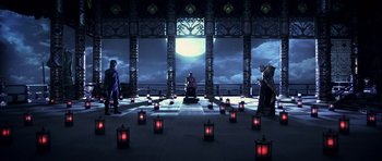 Movie still from “Goemon” (2009), directed by Kazuaki Kiriya – A group of people standing in front of a large moon lit building; Extreme Wide shot, High angle