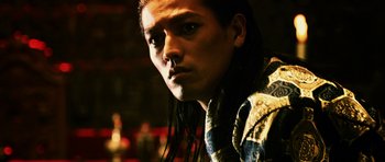 Movie still from “Goemon” (2009), directed by Kazuaki Kiriya – A person with long black hair; Close Up shot, Low angle