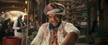 Movie still from “Goliyon Ki Raasleela Ram Leela” (2013), directed by Sanjay Leela Bhansali – A man with a turban is smiling for the camera; Close Up shot, Low angle