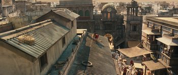 Movie still from “Goliyon Ki Raasleela Ram Leela” (2013), directed by Sanjay Leela Bhansali – An aerial view of an old city with a clock tower; Extreme Wide shot, High angle