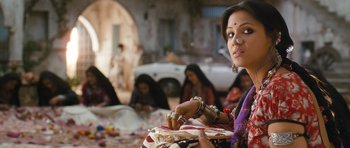 Movie still from “Goliyon Ki Raasleela Ram Leela” (2013), directed by Sanjay Leela Bhansali – A woman sitting in front of other women in a room; Close Up shot, Over the shoulder angle