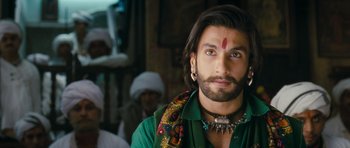 Movie still from “Goliyon Ki Raasleela Ram Leela” (2013), directed by Sanjay Leela Bhansali – A person with a beard; Close Up shot, Low angle