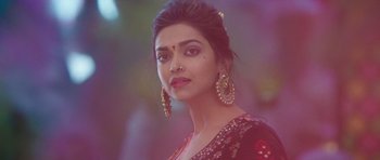 Movie still from “Goliyon Ki Raasleela Ram Leela” (2013), directed by Sanjay Leela Bhansali – A person wearing a dress; Close Up shot, Low angle