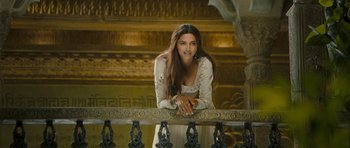 Movie still from “Goliyon Ki Raasleela Ram Leela” (2013), directed by Sanjay Leela Bhansali – A beautiful young woman leaning on a railing; Medium shot, Over the shoulder angle