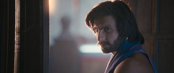 Movie still from “Goliyon Ki Raasleela Ram Leela” (2013), directed by Sanjay Leela Bhansali – A person with a beard; Close Up shot, Low angle