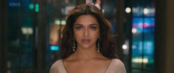 Movie still from “Goliyon Ki Raasleela Ram Leela” (2013), directed by Sanjay Leela Bhansali – A person wearing a white shirt; Close Up shot, High angle