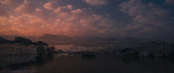 Movie still from “Goliyon Ki Raasleela Ram Leela” (2013), directed by Sanjay Leela Bhansali – A view of a body of water and a city at night; Extreme Wide shot, High angle