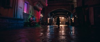 Movie still from “Goliyon Ki Raasleela Ram Leela” (2013), directed by Sanjay Leela Bhansali – A person walking down a street at night; Extreme Wide shot, High angle