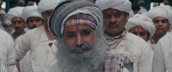Movie still from “Goliyon Ki Raasleela Ram Leela” (2013), directed by Sanjay Leela Bhansali – A man with long grey hair and a beard wearing a turban; Close Up shot, Over the shoulder angle