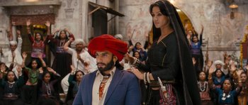 Movie still from “Goliyon Ki Raasleela Ram Leela” (2013), directed by Sanjay Leela Bhansali – A man and a woman are getting ready for a fashion show; Medium shot, Low angle