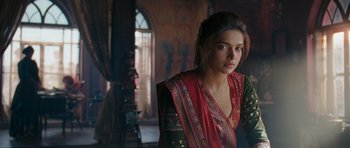 Movie still from “Goliyon Ki Raasleela Ram Leela” (2013), directed by Sanjay Leela Bhansali – Deepika padukone in a red and black sari; Medium shot, Over the shoulder angle