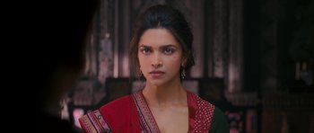 Movie still from “Goliyon Ki Raasleela Ram Leela” (2013), directed by Sanjay Leela Bhansali – Deepika padukon in a red and black outfit; Close Up shot, Over the shoulder angle
