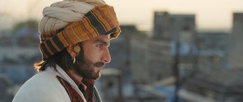 Movie still from “Goliyon Ki Raasleela Ram Leela” (2013), directed by Sanjay Leela Bhansali – A person wearing a turban; Close Up shot, Low angle