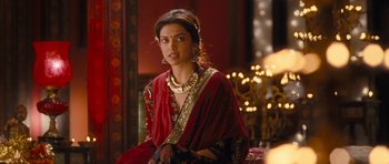 Movie still from “Goliyon Ki Raasleela Ram Leela” (2013), directed by Sanjay Leela Bhansali – Deepika padukone in a red and gold sari; Medium shot, Over the shoulder angle