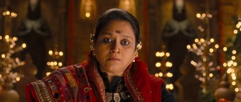 Movie still from “Goliyon Ki Raasleela Ram Leela” (2013), directed by Sanjay Leela Bhansali – A person wearing a necklace; Close Up shot, Over the shoulder angle