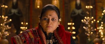 Movie still from “Goliyon Ki Raasleela Ram Leela” (2013), directed by Sanjay Leela Bhansali – A person wearing a necklace; Close Up shot, Over the shoulder angle