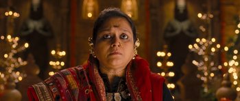 Movie still from “Goliyon Ki Raasleela Ram Leela” (2013), directed by Sanjay Leela Bhansali – An indian woman wearing a red and black outfit; Close Up shot, Low angle