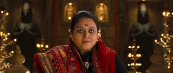 Movie still from “Goliyon Ki Raasleela Ram Leela” (2013), directed by Sanjay Leela Bhansali – A person wearing a necklace; Close Up shot, High angle