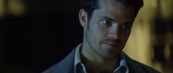 Movie still from “Gone in 60 Seconds” (2000), directed by Dominic Sena – A person wearing a shirt; Close Up shot, Over the shoulder angle