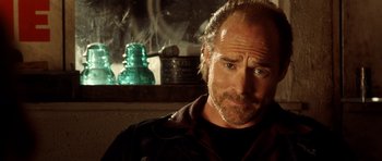 Movie still from “Gone in 60 Seconds” (2000), directed by Dominic Sena – A person wearing a jacket; Close Up shot, Low angle