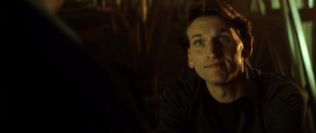 Movie still from “Gone in 60 Seconds” (2000), directed by Dominic Sena – A person sitting in front of a window; Close Up shot, Over the shoulder angle