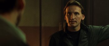 Movie still from “Gone in 60 Seconds” (2000), directed by Dominic Sena – A person wearing a black shirt; Close Up shot, Low angle