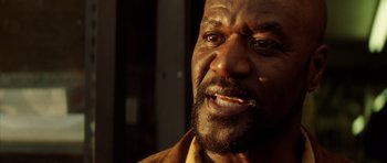 Movie still from “Gone in 60 Seconds” (2000), directed by Dominic Sena – A person with a beard; Close Up shot, Low angle