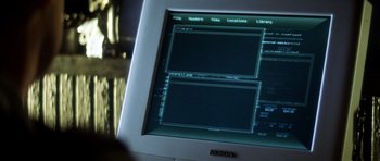 Movie still from “Gone in 60 Seconds” (2000), directed by Dominic Sena – A computer screen with two screens on it; Extreme Close Up shot, High angle