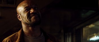 Movie still from “Gone in 60 Seconds” (2000), directed by Dominic Sena – A person with a beard; Close Up shot, Over the shoulder angle