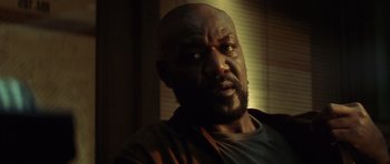 Movie still from “Gone in 60 Seconds” (2000), directed by Dominic Sena – A person looking at the camera; Close Up shot, Low angle