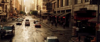 Movie still from “Gone in 60 Seconds” (2000), directed by Dominic Sena – A city street with cars parked on the side of the road; Extreme Wide shot, High angle