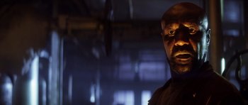 Movie still from “Gone in 60 Seconds” (2000), directed by Dominic Sena – A person wearing a hat; Close Up shot, Low angle